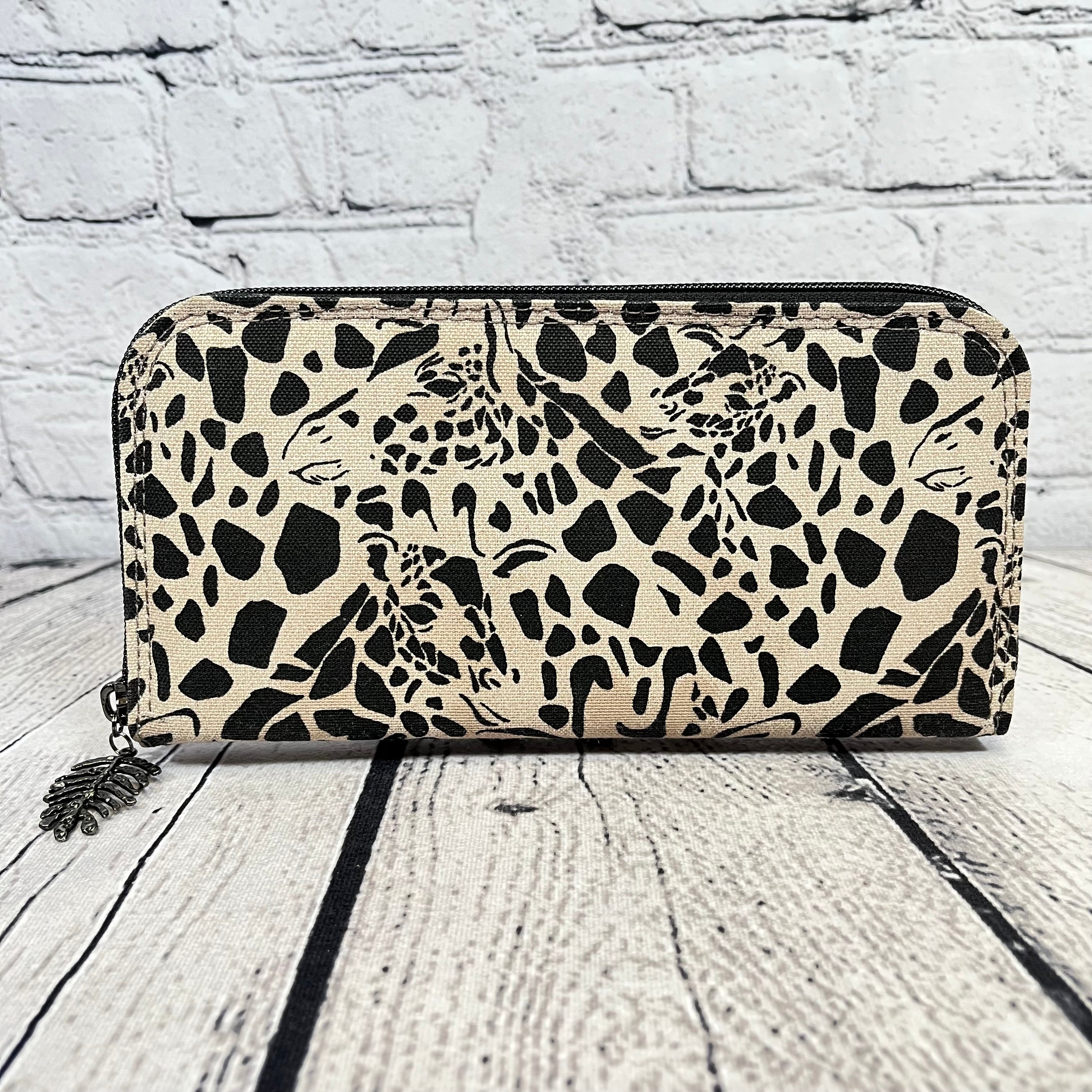 Large RFID Zip Around Clutch Wallet - Black and Tan Giraffe Print